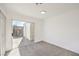 Bright bedroom with sliding glass doors to the backyard at 2504 Clayton St, North Las Vegas, NV 89032