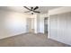 Spacious bedroom with carpeted floors, closet, and access to another room at 2504 Clayton St, North Las Vegas, NV 89032