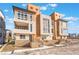 Contemporary three-story townhome with modern design and neutral color palette at 2511 Silent View Ave, Henderson, NV 89044