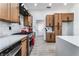 Modern kitchen with stainless steel appliances and wood cabinets at 2717 Vista Butte Dr, Las Vegas, NV 89134