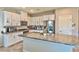 Modern kitchen featuring white cabinets and granite countertops at 341 Night Dove St, Henderson, NV 89011