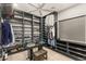 Spacious walk-in closet with ample shelving and hanging space at 4024 Desert Trace Ct, Las Vegas, NV 89129