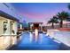 Luxury pool and spa with waterfall feature at 4024 Desert Trace Ct, Las Vegas, NV 89129