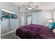 Main bedroom with large bed and ceiling fan at 5216 Velazco Ln, Las Vegas, NV 89130