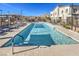 Community pool with plenty of lounge chairs at 600 N Carriage Hill Dr # 1187, Las Vegas, NV 89138