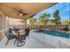 Relaxing patio area with seating and a view of the pool at 625 Doubleshot Ln, Henderson, NV 89052