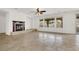 Living room with fireplace and lots of natural light at 7738 Comanche Canyon Ave, Las Vegas, NV 89113