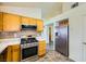 Kitchen features stainless steel appliances and wood cabinets at 7900 Mt Shasta Cir, Las Vegas, NV 89145