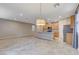 Spacious dining area with large windows and stylish light fixture at 9303 Ettrick Ct, Las Vegas, NV 89178