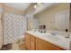 Bathroom with double sinks and shower/tub combo at 9715 Aleutian St, Las Vegas, NV 89178