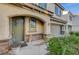 Charming front entryway with a decorative door and stone accents at 9715 Aleutian St, Las Vegas, NV 89178