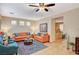 Open concept living room with a view into the kitchen area at 9715 Aleutian St, Las Vegas, NV 89178