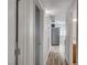 Bright hallway with light grey walls and wood flooring at 1020 Nassau Dr, Las Vegas, NV 89108