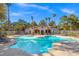 Inviting community pool with lounge chairs at 2110 Sealion Dr # 204, Las Vegas, NV 89128