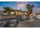 Elegant two-story home with landscaped yard and a curved driveway at 2111 Alberti Ct, Las Vegas, NV 89117