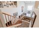 Staircase leading to the second floor, overlooking the living room at 2939 Cafe Racer Ct, North Las Vegas, NV 89031