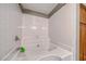 Clean bathroom with a shower/tub combo and tile flooring at 3145 E Flamingo Rd # 1045, Las Vegas, NV 89121