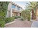 Townhouse exterior with landscaping and walkway at 3366 Loma Linda Ln, Las Vegas, NV 89121