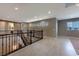 Spacious upstairs hallway with wood-look flooring and wrought-iron railings at 445 Rosina Vista St, Las Vegas, NV 89138