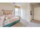 Light and airy bedroom featuring a twin-size bed and built-in closet at 5655 Scarlet Rock St # Lot 93, North Las Vegas, NV 89081