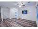 Spacious living area with wood-look floors and ceiling fan at 600 N Carriage Hill Dr # 1164, Las Vegas, NV 89138