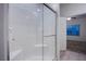 Modern shower with glass enclosure and built-in seat at 600 N Carriage Hill Dr # 1164, Las Vegas, NV 89138