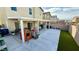 Covered patio, artificial turf, and play structure at 7544 Pink Mimosa Ave, Las Vegas, NV 89113