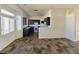 Spacious kitchen with dark cabinets and tile flooring at 2108 Panther Pl, North Las Vegas, NV 89031