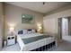 Primary bedroom with king-size bed, nightstands, and large closet at 2709 Orchid Valley Dr, Las Vegas, NV 89134