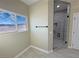 Bathroom with shower, window, and mountain views at 2800 Wisteria Way, Pahrump, NV 89048