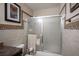 Updated bathroom with granite vanity and large shower at 4250 Carolyn Dr, Las Vegas, NV 89103