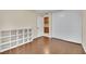 Bedroom with wood-look floors and ample closet space at 4751 Torrence Dr, Las Vegas, NV 89103