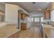 Open kitchen with ample counter space and wood cabinets at 5899 Lewis Falls Ave, Las Vegas, NV 89139