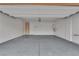 Spacious garage with epoxy flooring and overhead storage at 6427 Terra Miranda Ave, Las Vegas, NV 89118