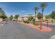 Gated community entrance with lush landscaping at 7400 W Flamingo Rd # 1006, Las Vegas, NV 89147