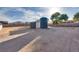 Empty lot with shed and water tank visible at 8645 Edmond St, Las Vegas, NV 89139