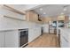 Modern kitchen with stainless steel appliances and light wood cabinets at 8645 Edmond St, Las Vegas, NV 89139