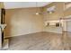 Open living room with high ceilings and kitchen bar at 8949 Clairton Ct, Las Vegas, NV 89117