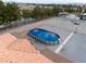 Blue oval above ground pool in the backyard at 1761 Iguana St, Pahrump, NV 89048