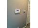 Home security and thermostat controls at 3025 Fort Stanwix Rd, Henderson, NV 89052