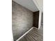 Gray textured wall with white baseboard at 3025 Fort Stanwix Rd, Henderson, NV 89052