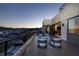 Spacious balcony with city views and outdoor seating at 32 Highland Cove Ln, Henderson, NV 89011