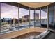 Luxury living room with expansive windows and city views at 360 E Desert Inn Rd # 404, Las Vegas, NV 89109