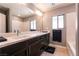 Double vanity bathroom with a soaking tub and modern finishes at 363 Terrill Ave, Las Vegas, NV 89183