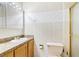 Clean bathroom with wood cabinets and a shower/tub combo at 3669 Casey Dr, Las Vegas, NV 89120