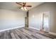 Bedroom with wood-look floors and an en-suite bathroom at 4200 Tolkien Ave, Las Vegas, NV 89115