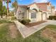 Attractive exterior of a single-story home with a landscaped yard at 5998 Greenery View Ln, Las Vegas, NV 89118