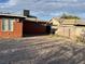 Backyard with a gravel area and a clothesline at 6529 Bourbon Way, Las Vegas, NV 89107