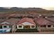 Aerial view of house and surrounding neighborhood at 6544 Corsari Ridge St, Las Vegas, NV 89166