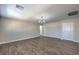 Spacious bedroom with wood-look floors and access to hallway at 6608 Fort William St, North Las Vegas, NV 89084